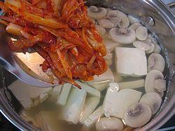 韩式泡菜蛤蜊汤的做法步骤7