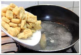 无锡最有名的特色小吃-卤汁豆腐干的做法图解2