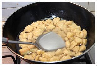 无锡最有名的特色小吃-卤汁豆腐干的做法图解3